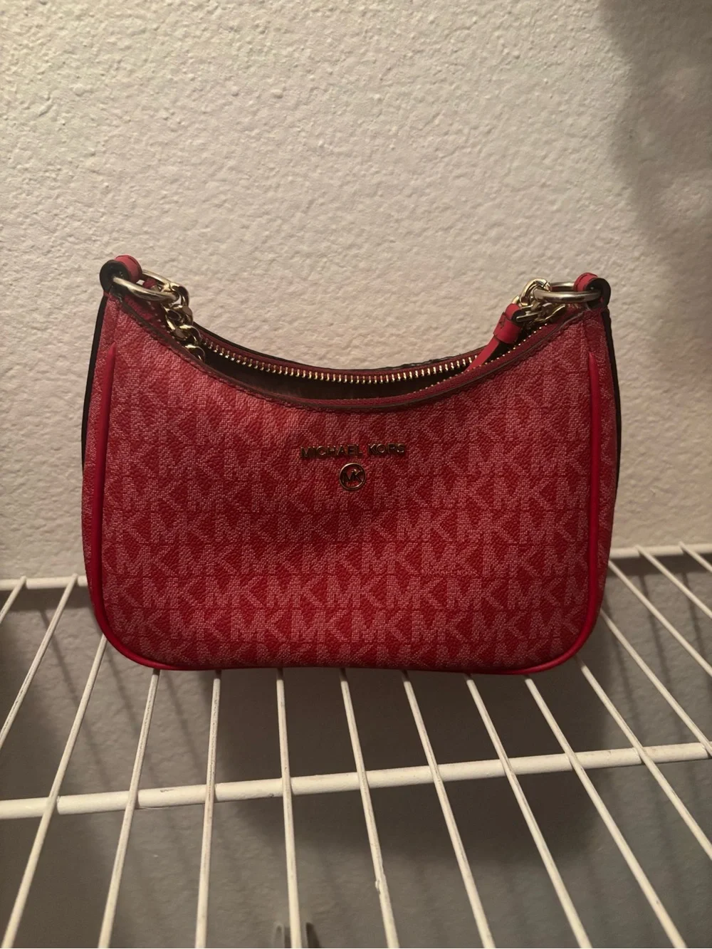 Michael kors red monogram shoulder bag . Willing to negotiate
